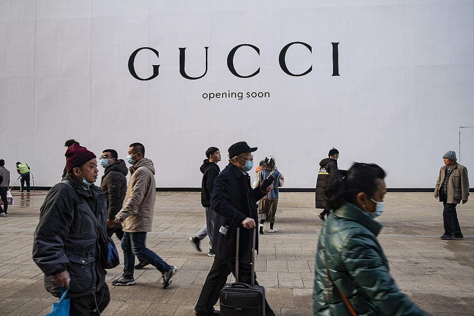 A luxury goods store under renovation in Shanghai, China. The Centre for Economics and Business Research says China looks set for average economic growth of 5.7 per cent a year from next year to 2025, before slowing to 4.5 per cent a year from 2026 t