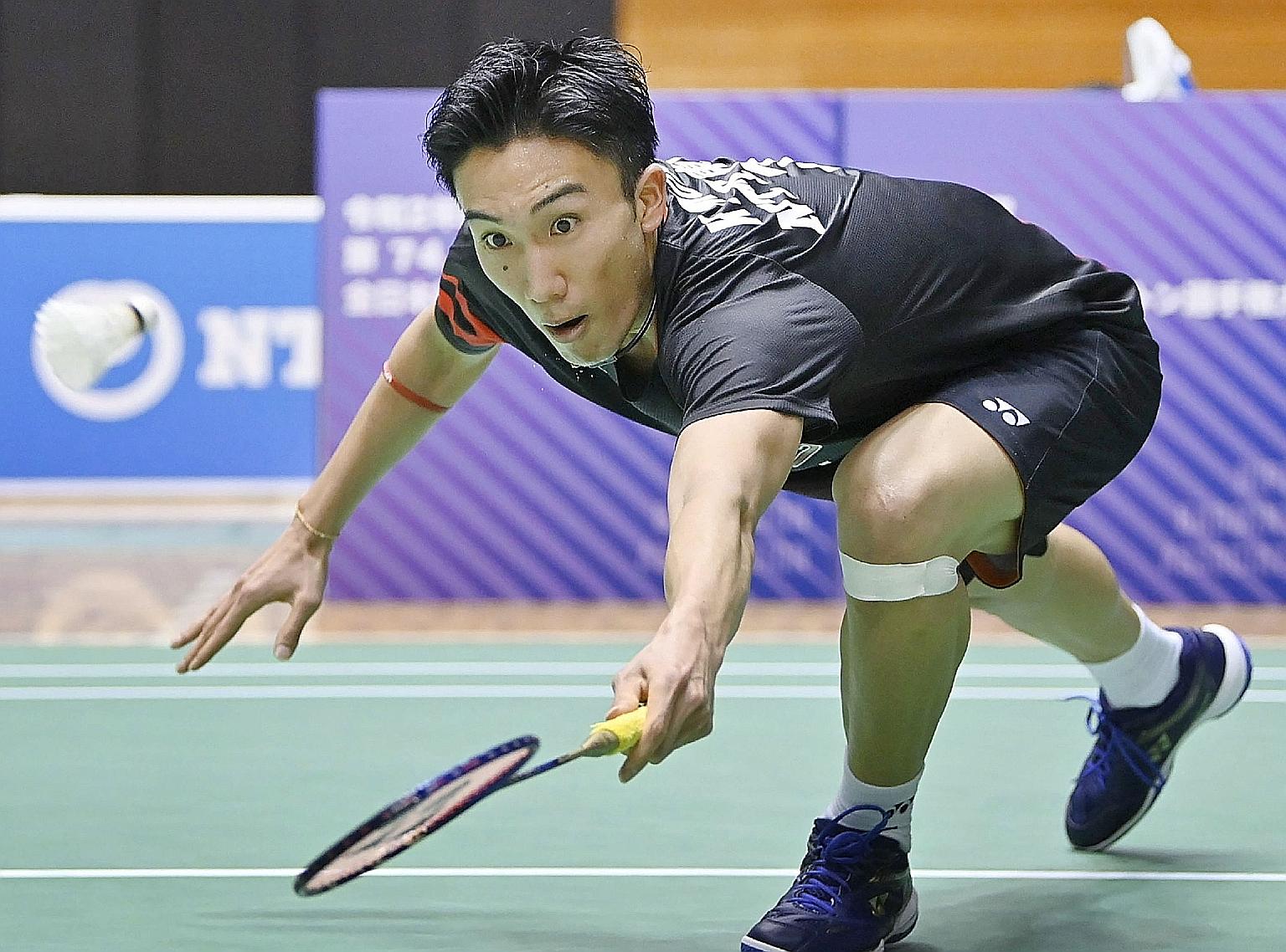 World No. 1 Kento Momota stretching for a drop shot in yesterday's final against Kanta Tsuneyama. He won in three games.