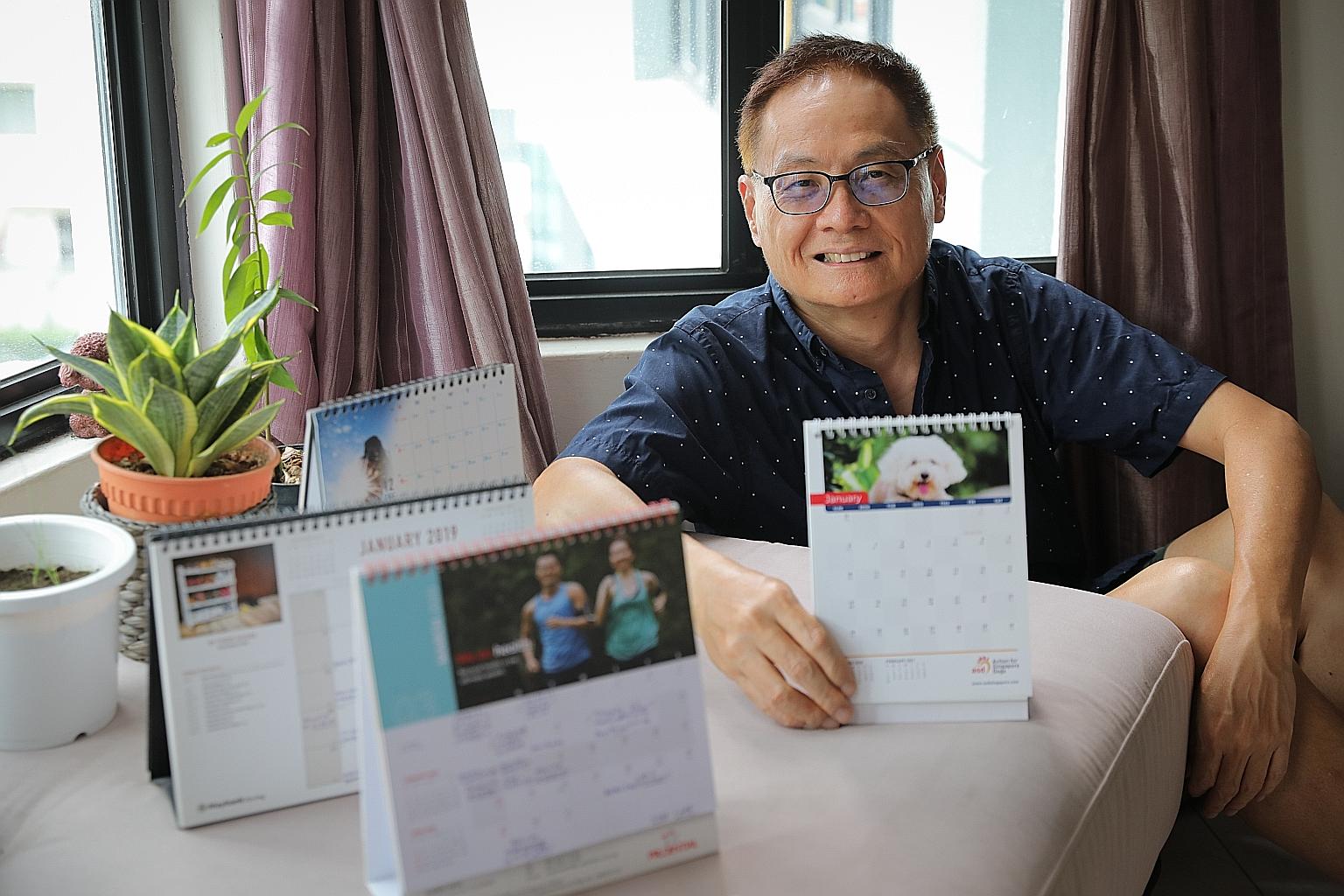 Mr Peter Lim, who has been using desk calendars for years, with his old and new calendars.