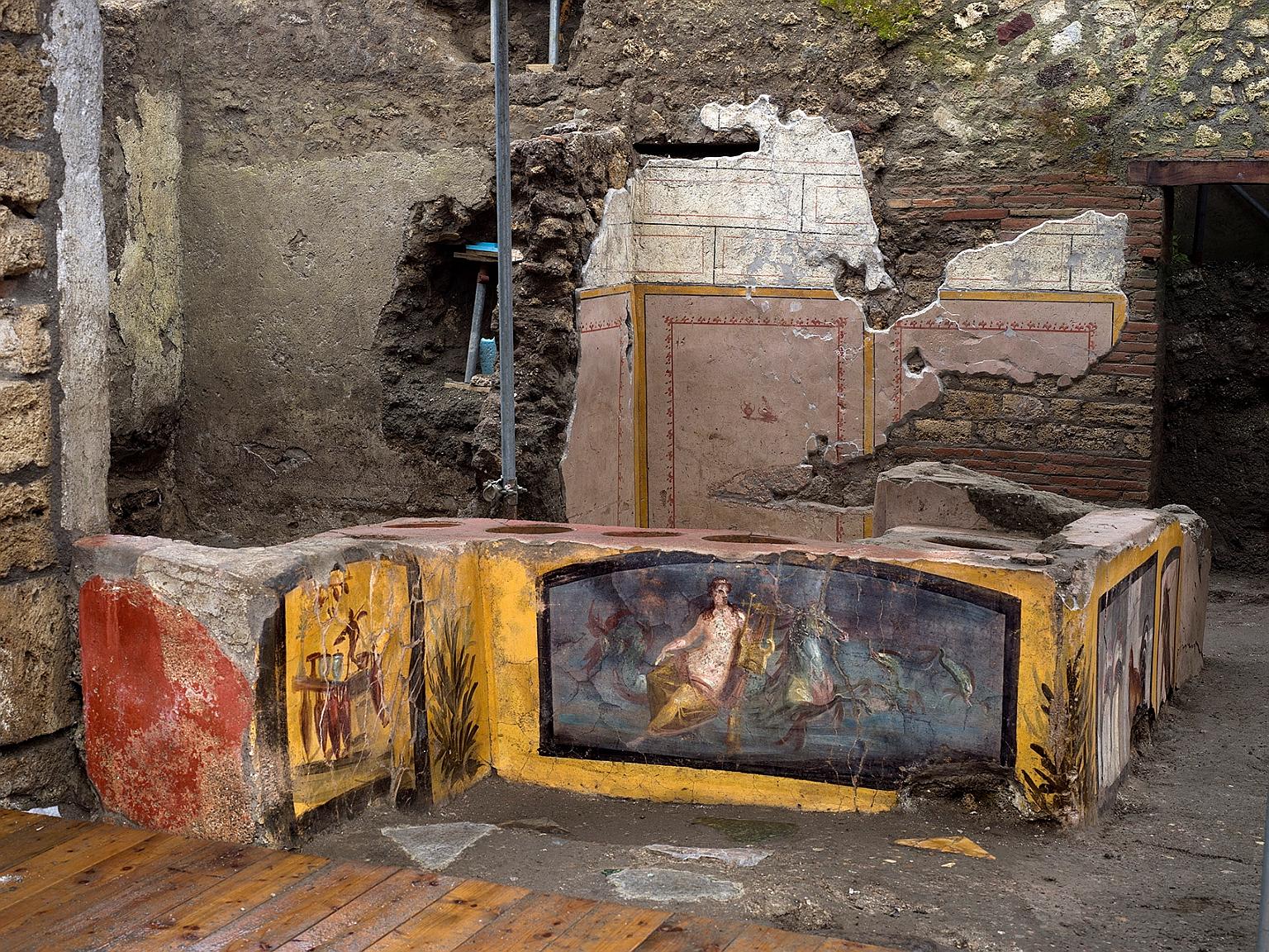 An ancient thermopolium, or snack bar, discovered during excavations in Pompeii, Italy. About 80 thermopolii have been found in the ruins of the former Roman city.