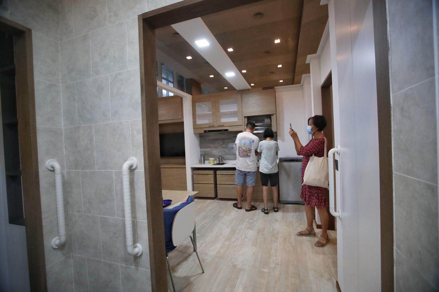 Seniors Visit Show-flat For Singapore's First Assisted-living HDB Flats ...