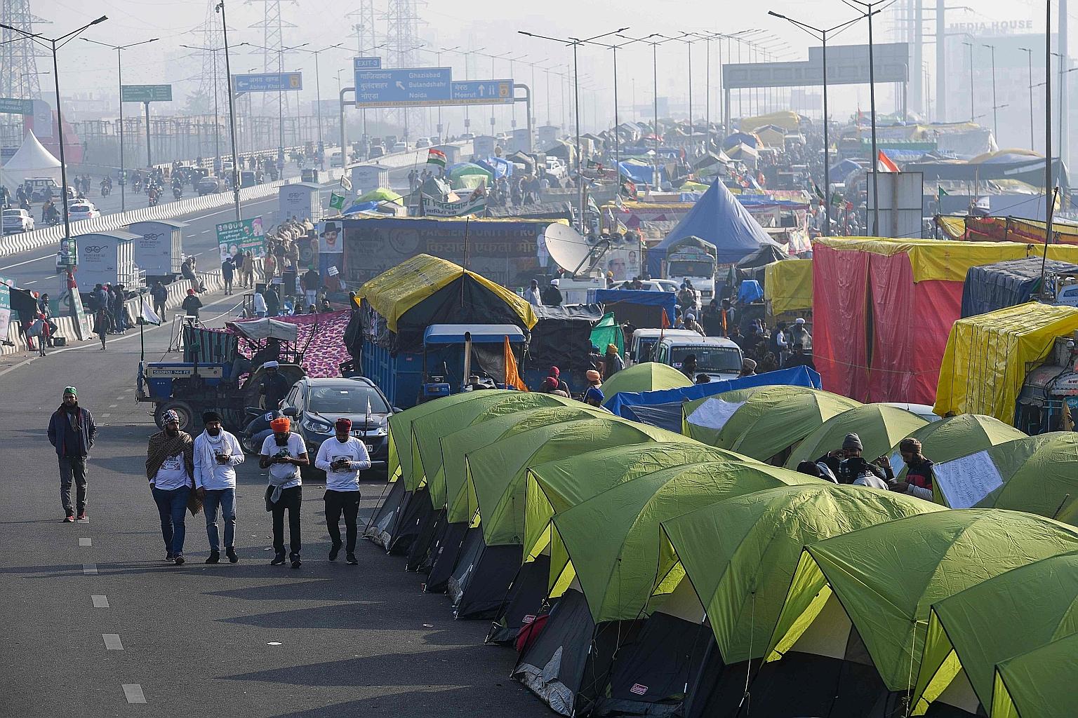 Tents pitched on a blocked highway in Ghaziabad on the Delhi-Uttar Pradesh state border in India, during an ongoing protest against the central government's recent agricultural reforms. Tens of thousands of farmers continue to camp out on highways ne