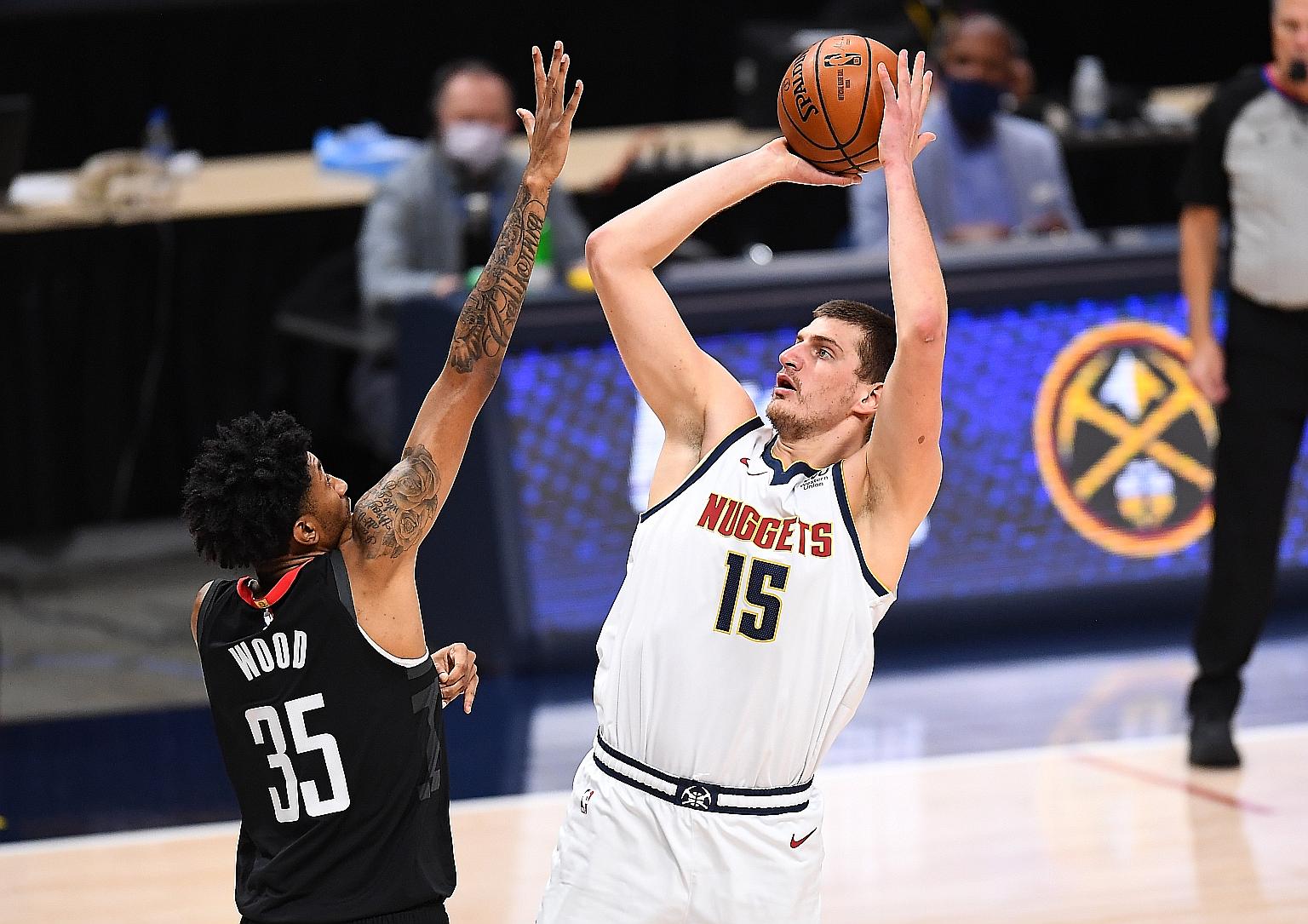 Denver Nuggets centre Nikola Jokic shooting during the 124-111 NBA win over the Rockets on Monday. He finished with a 19-point triple-double.