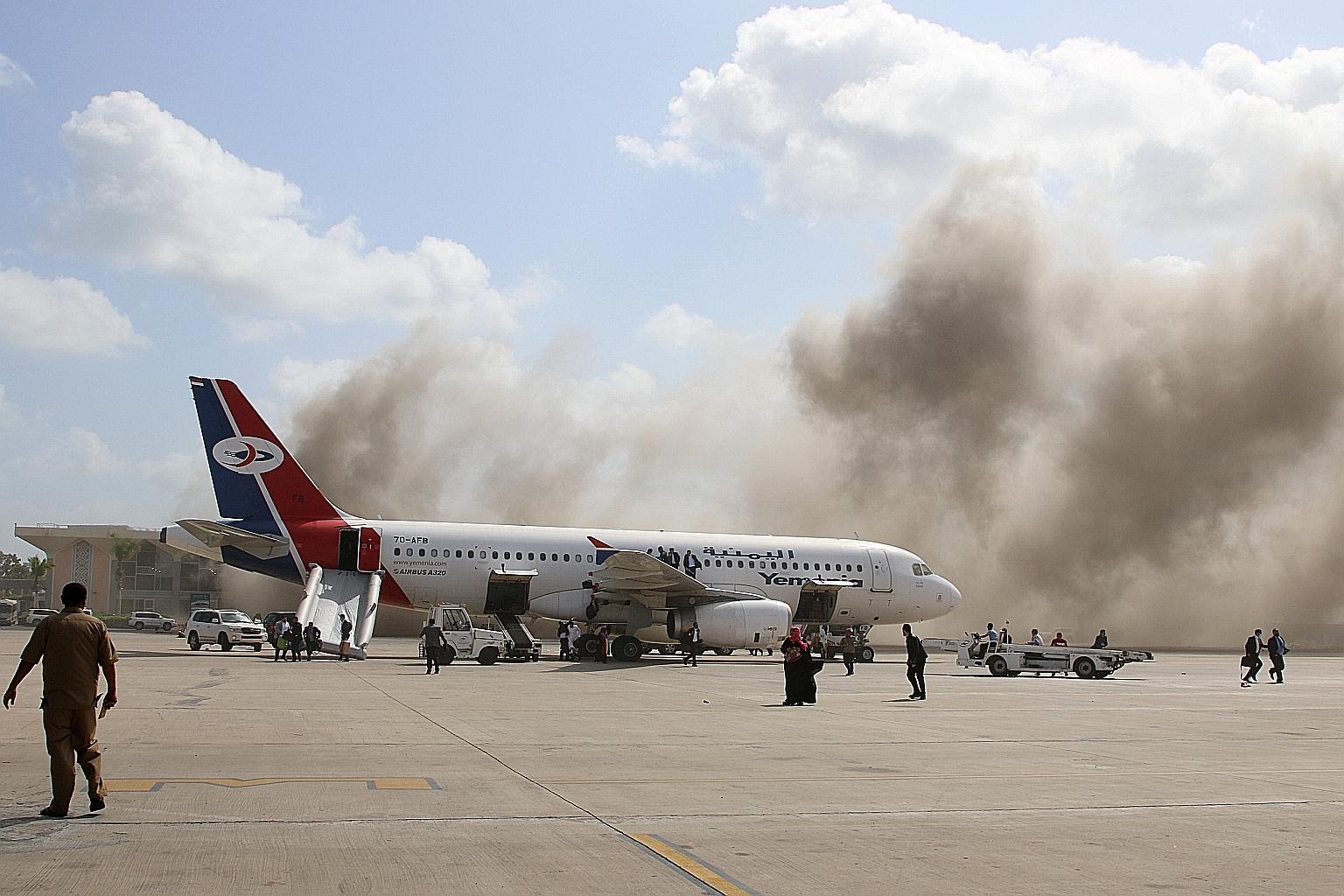 Blasts and gunfire were heard at Aden airport yesterday, shortly after a plane carrying a newly formed Cabinet for government-held parts of Yemen arrived from Saudi Arabia. A local security source said three mortar shells landed on the airport's hall