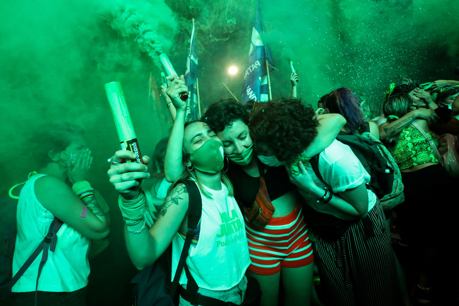 People celebrating after the Senate passed an abortion Bill in Buenos Aires, Argentina, yesterday. The fiercely contentious vote was held at 4am after a marathon debate that lasted through the night, and the Bill was passed in a vote of 38-29 with on