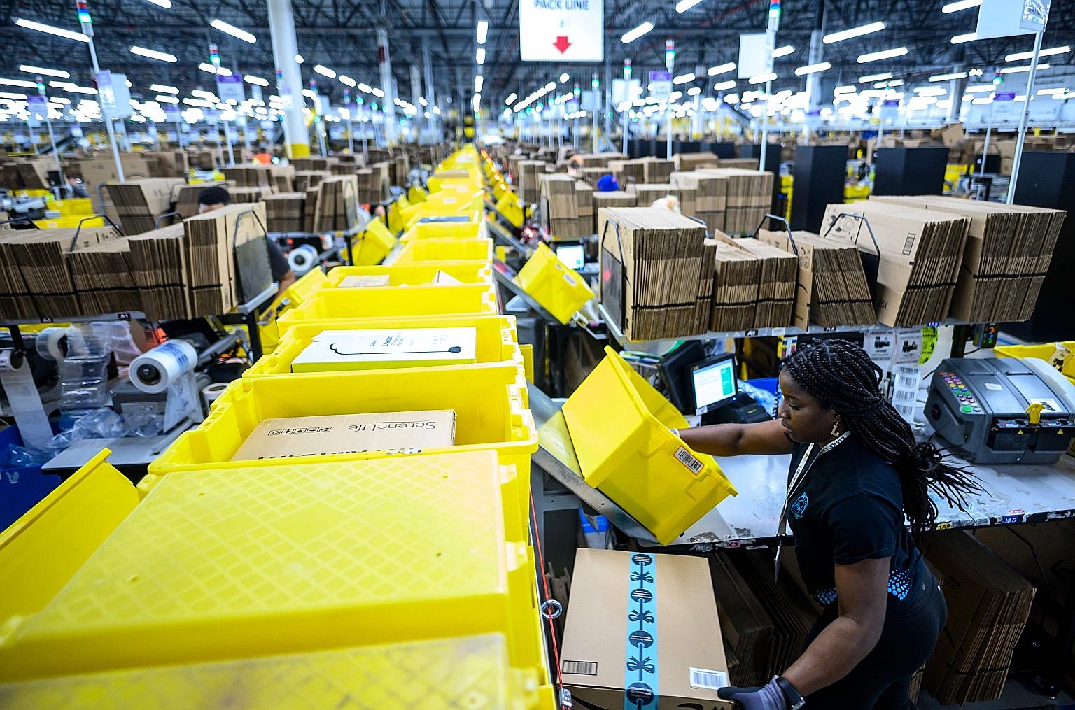 The Amazon fulfilment centre in Staten Island, New York City, seen in a 2019 file photo. Mega-cap companies such as Amazon and Apple helped lift the broad S&P 500 and Nasdaq, as well as gains in names that have benefited from the "stay-at-home" envir