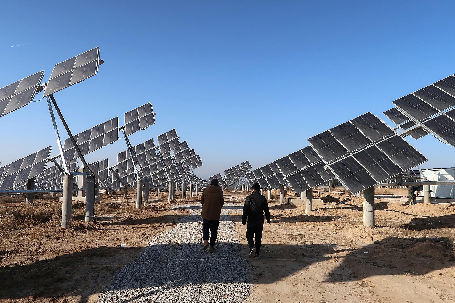 A solar power station in Tongchuan, Shaanxi province, in 2019. China's President Xi Jinping has pledged to raise wind and solar capacity to 1,200 gigawatts by 2030. PHOTO: REUTERS