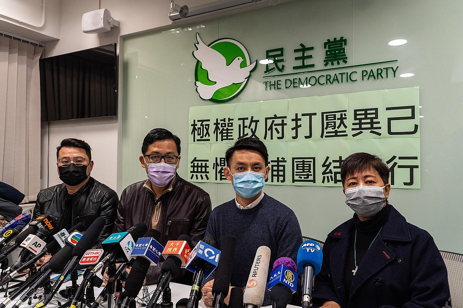 Hong Kong Democratic Party members (from left) Andrew Wan, Lam Cheuk-ting, Lo Kin-hei and Helena Wong at a conference they called yesterday after being released on bail following their arrests under the city's national security law. They were among 5