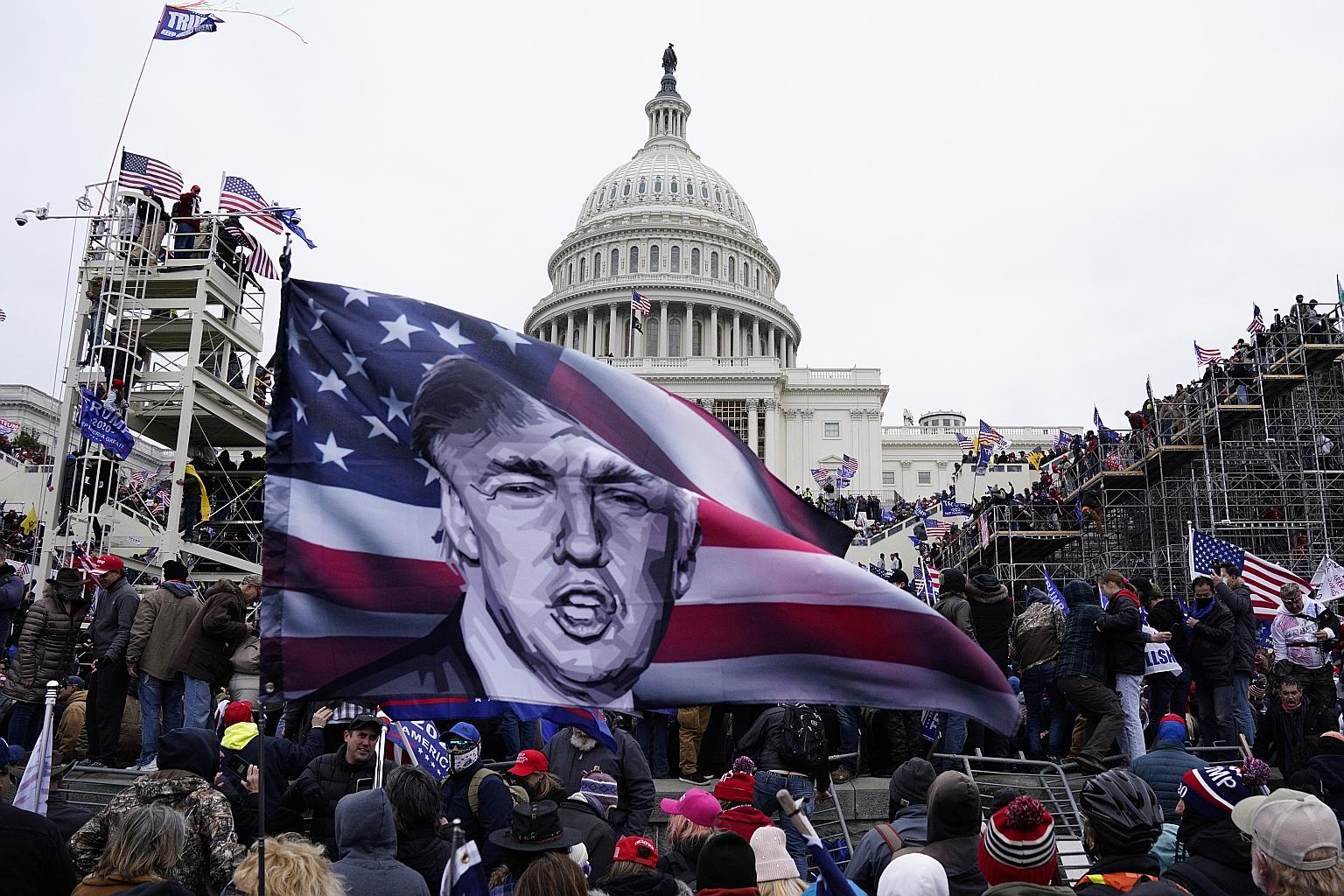 Protesters rallying outside the grounds of the US Capitol in Washington on Wednesday before storming in. President Donald Trump's die-hard supporters publicly floated some of the exact tactics used to storm the Capitol in comments that frequently inc