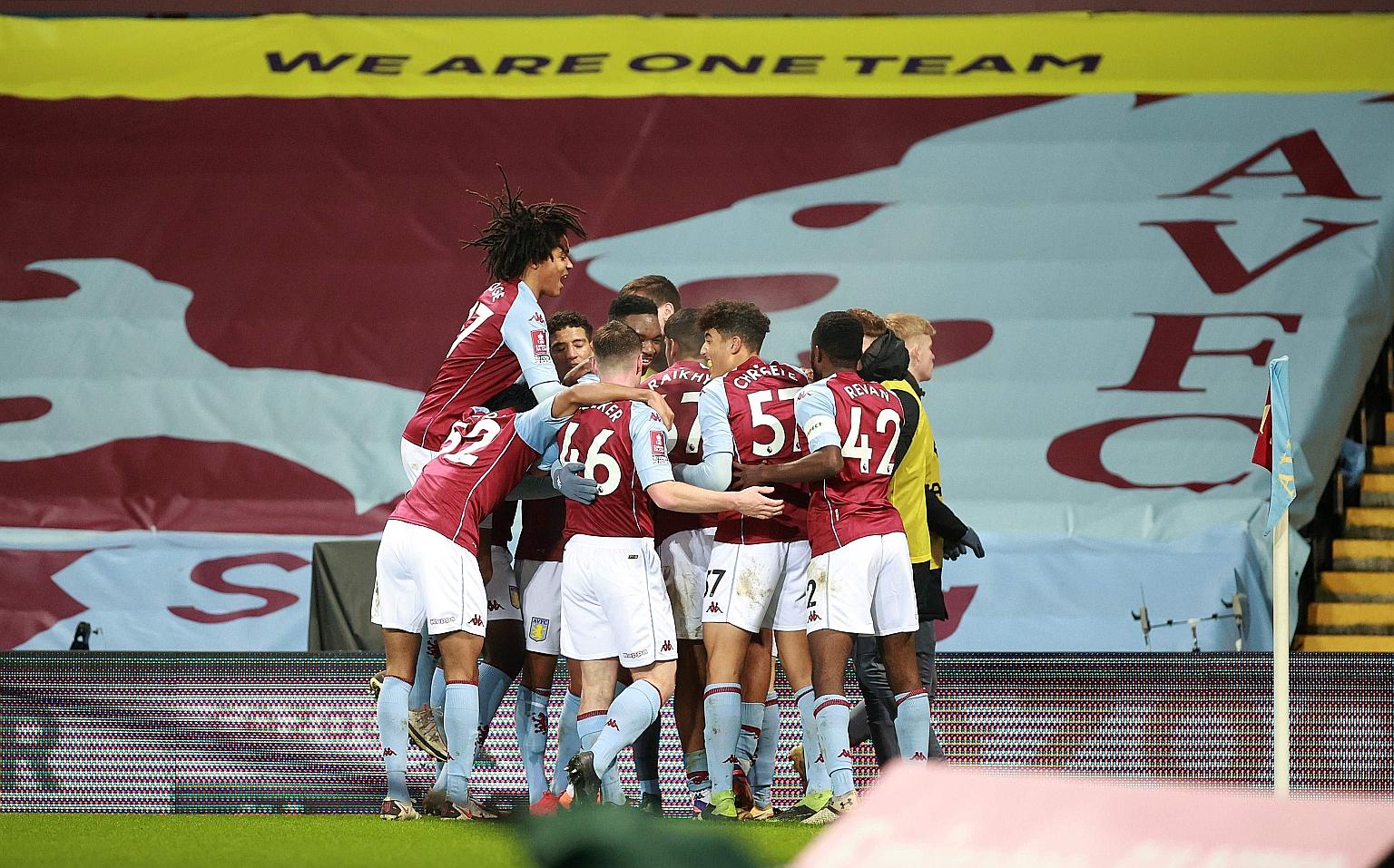 Aston Villa's makeshift team of academy players celebrate Louie Barry's goal against Liverpool in the FA Cup. It was a joy short-lived, however, as Liverpool ran out 4-1 winners.