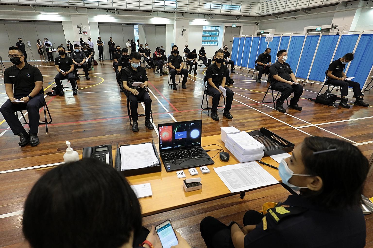 A total of 80 Home Team officers involved in front-line healthcare operations were the first in the Ministry of Home Affairs to receive their Covid-19 vaccinations yesterday, at the Singapore Civil Defence Force Headquarters.