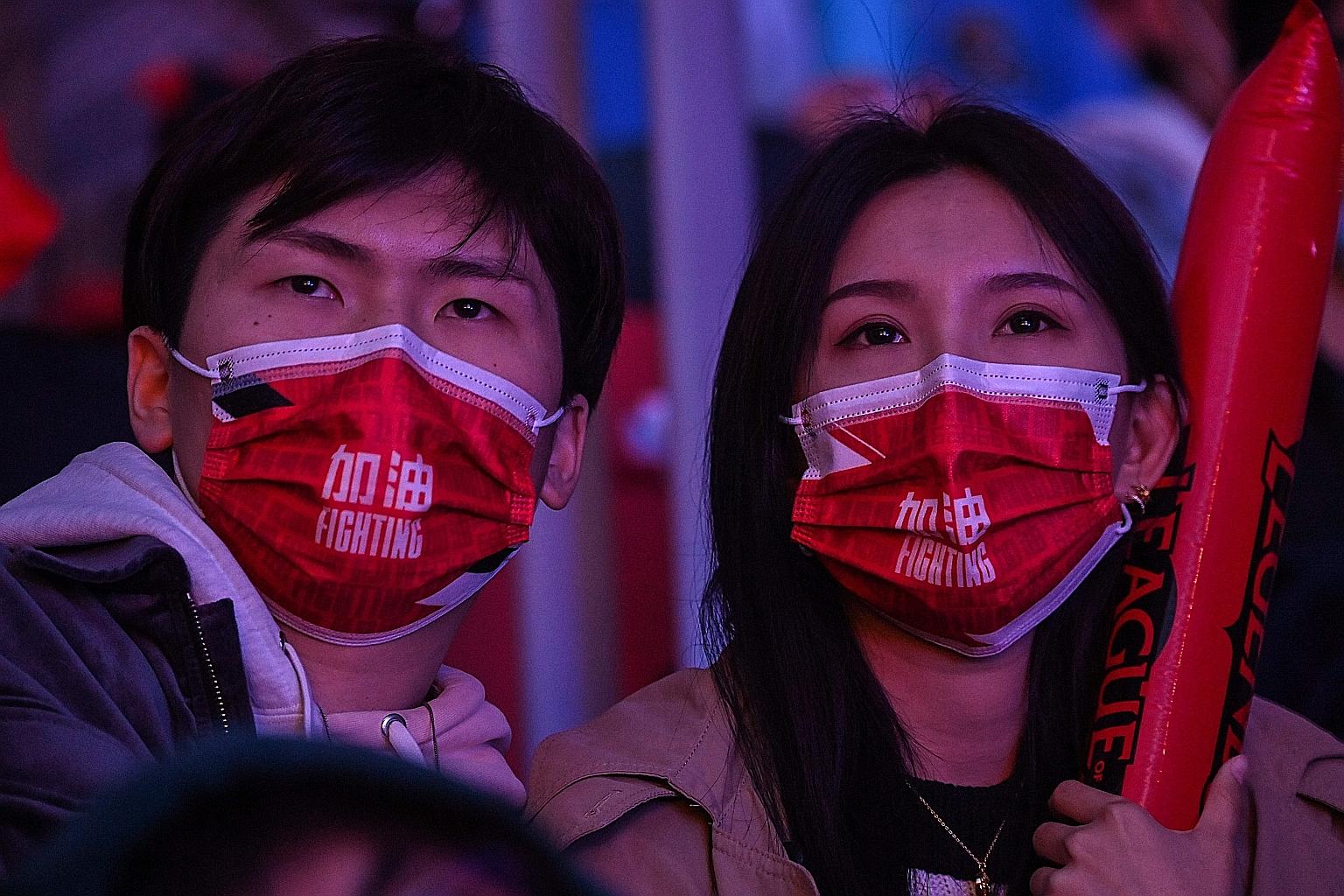 Fans watching the League of Legends world championships final in Shanghai between Suning and Damwon last October.