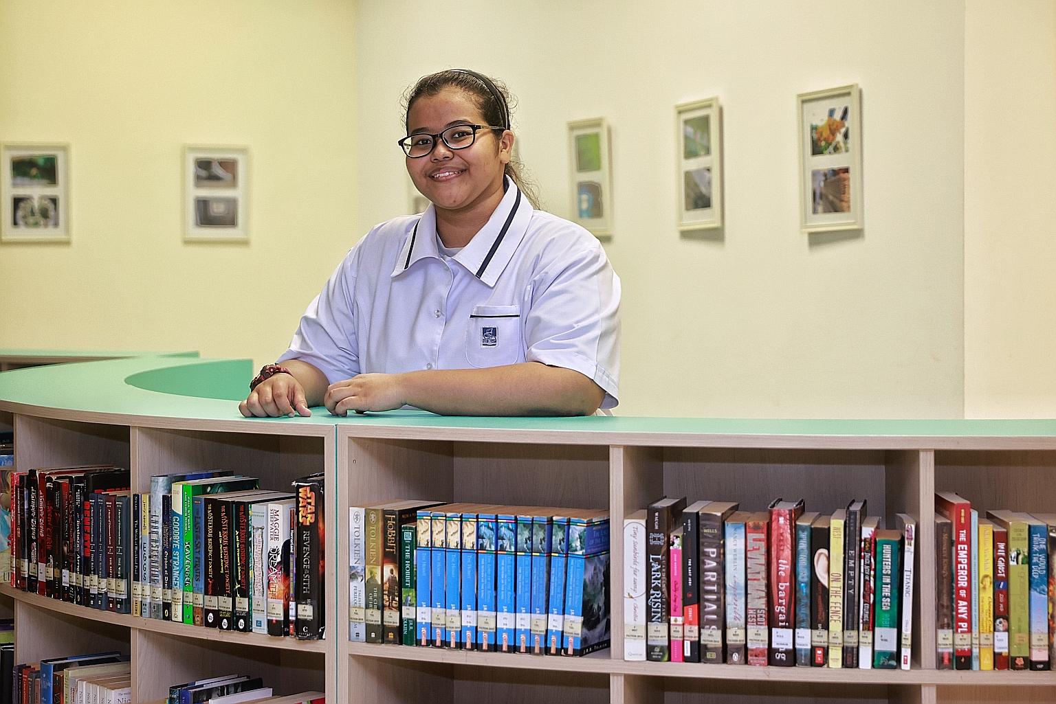Siti Aisyah Abdul Rahman scored six distinctions out of seven subjects for last year's O levels, and cleared English, getting a C6 grade for the subject. She hopes to study accountancy at Singapore Polytechnic. ST PHOTO: KEVIN LIM