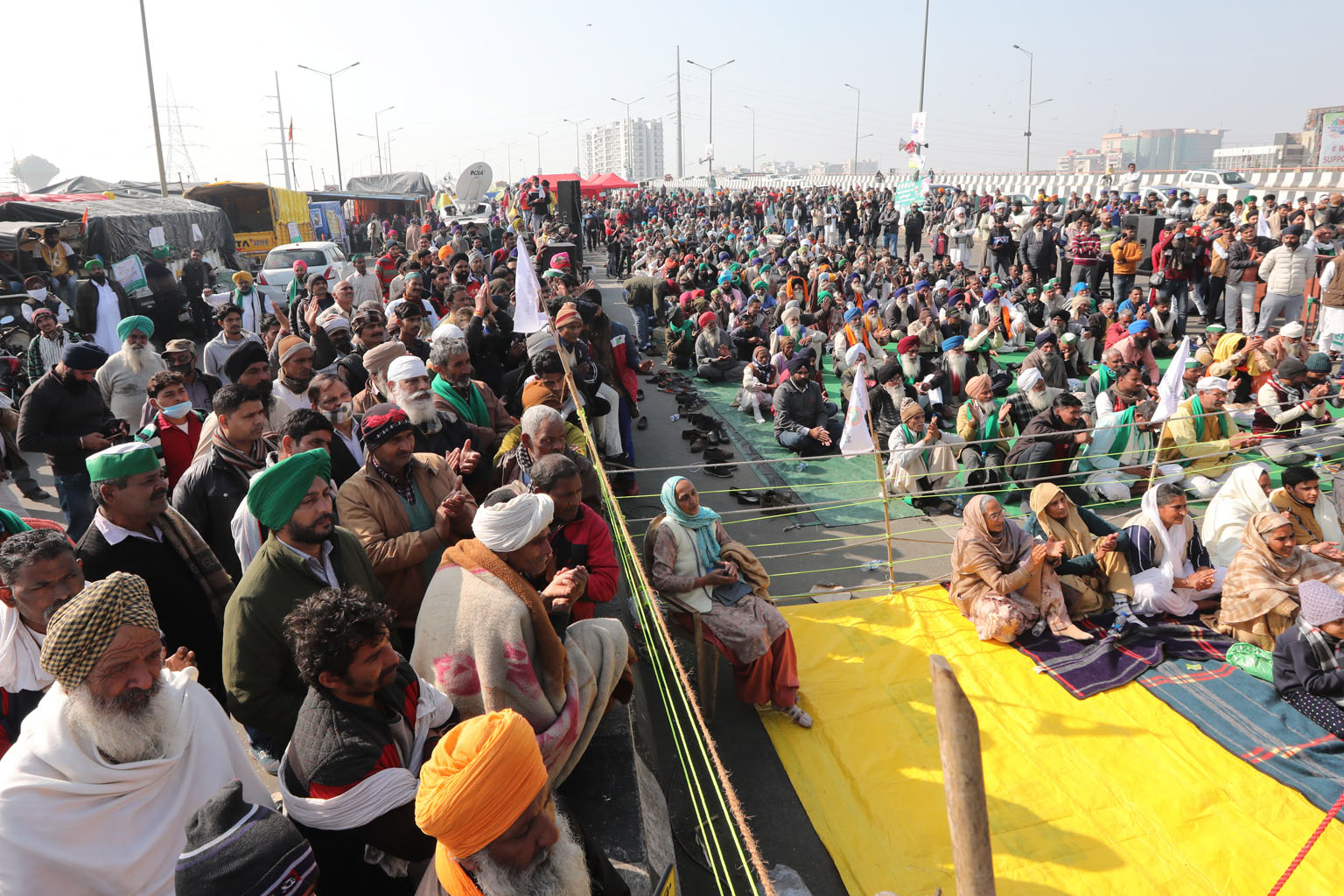 Indian farmers listening to a speaker at a protest site at the New Delhi-Uttar Pradesh border on Monday. Farm leaders, the opposition and some of Prime Minister Narendra Modi's allies fear the farm laws will lead to corporate control over agricultura