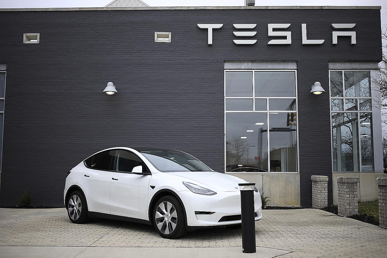 A Tesla Model S electric vehicle for sale outside a dealership in Ohio. The United States National Highway Traffic Safety Administration says it has tentatively concluded that the 2012-2018 Model S and 2016-2018 Model X vehicles "contain a defect rel