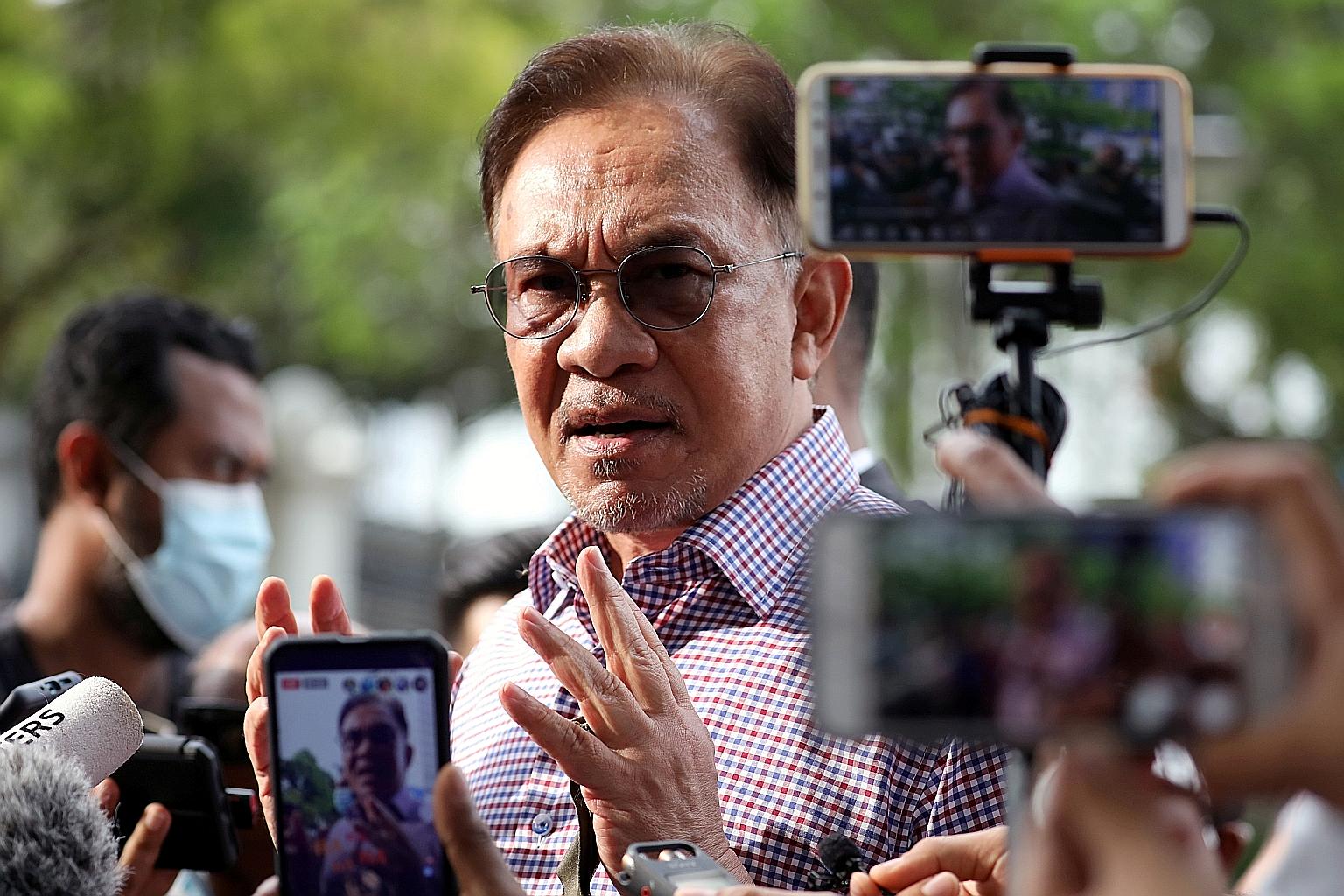 Malaysia's opposition leader Anwar Ibrahim says existing measures such as the movement control order were sufficient to control the spread of Covid-19. PHOTO: REUTERS