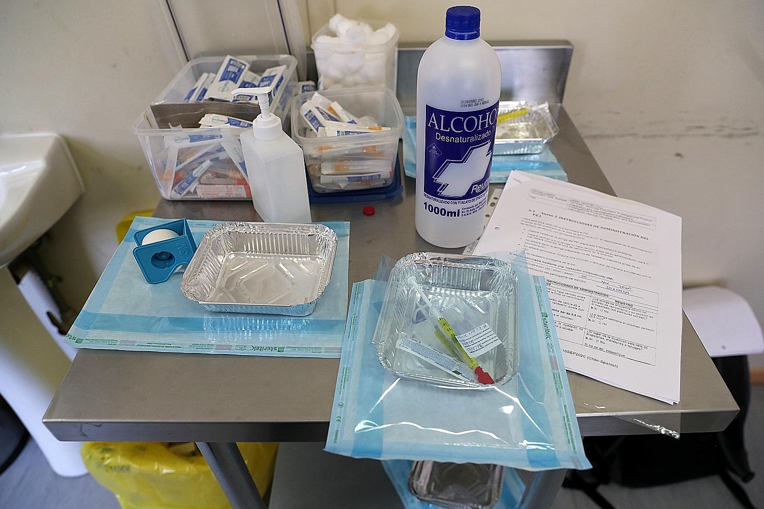 Items for Johnson & Johnson's one-shot vaccine trial seen at a medical facility in Santiago, Chile. A study released on Wednesday found that a second dose, given two months later, led to a three-fold rise in antibodies.