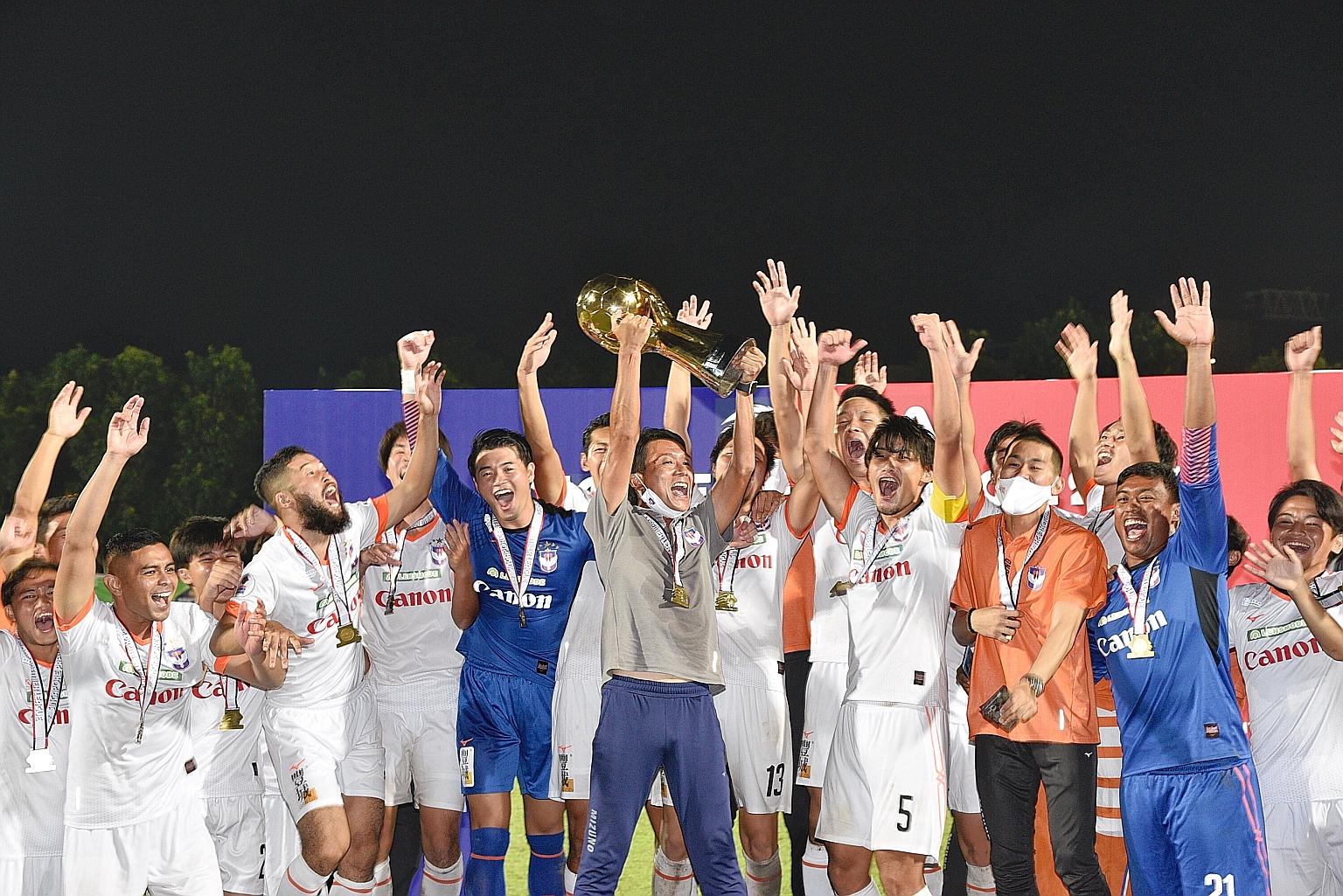 Albirex Niigata celebrating after winning their fourth Singapore Premier League title last month. But they face the prospect of just a week's training if next season's start is not delayed. ST FILE PHOTO