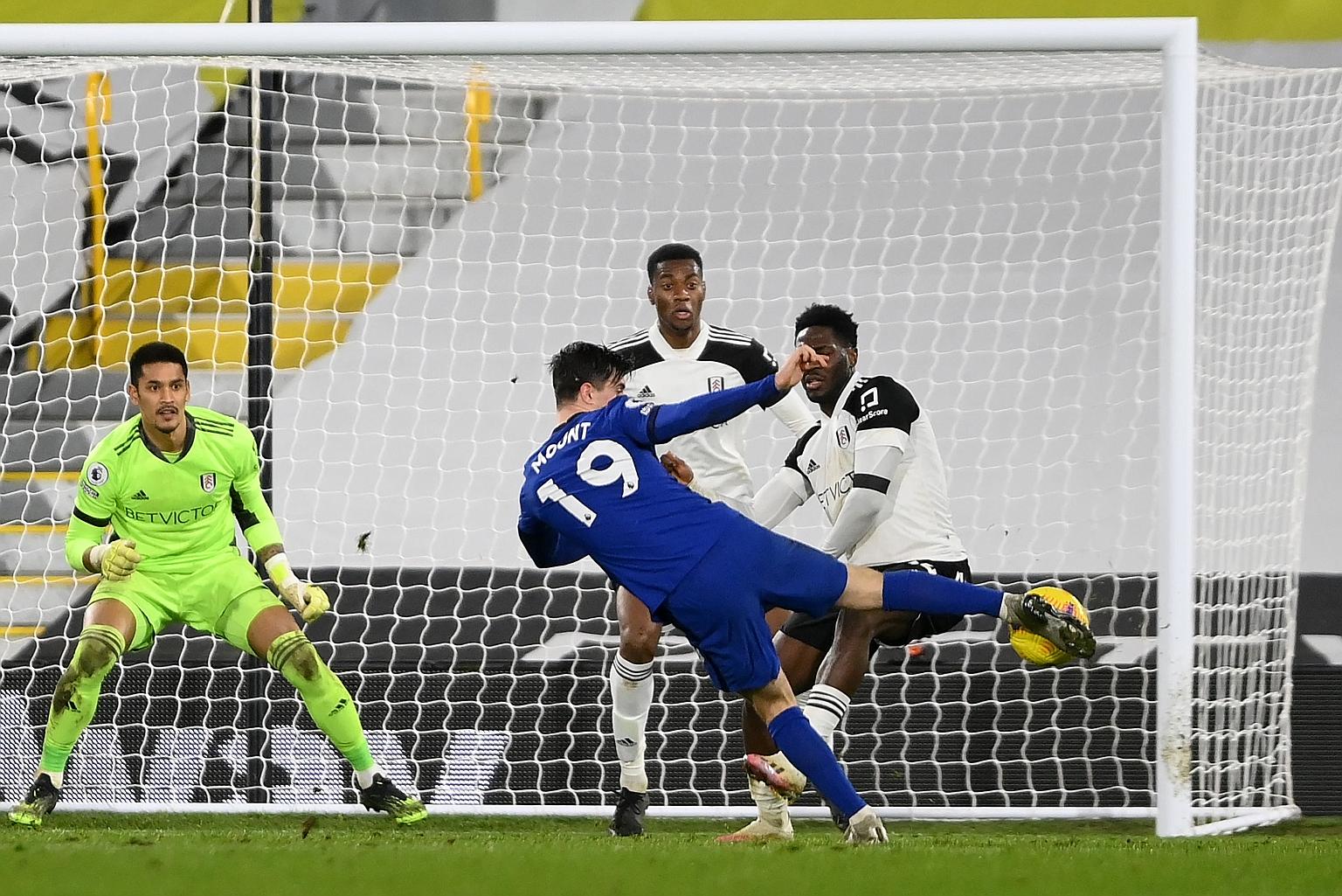 Chelsea midfielder Mason Mount scores the only goal against 10-man Fulham to secure a 1-0 victory at Craven Cottage. Lampard's side are now seventh on the league table. PHOTO: AGENCE FRANCE-PRESSE