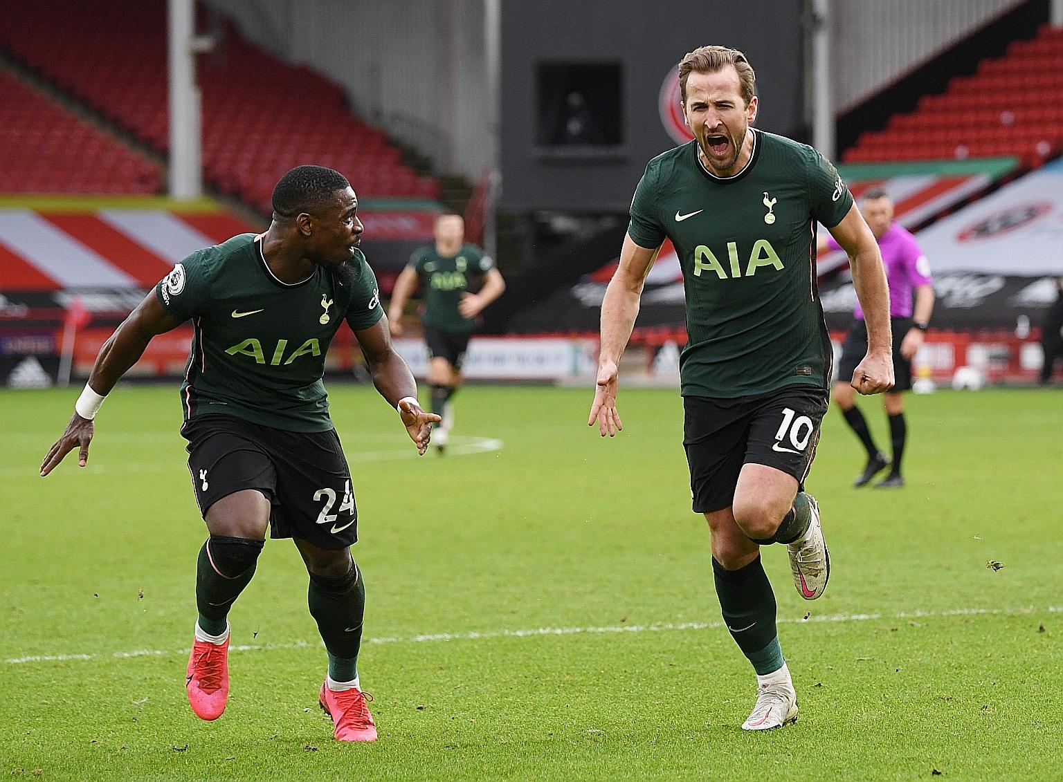 An elated Harry Kane is joined in celebration by Serge Aurier, after the Tottenham striker put his side two up against cellar-dwellers Sheffield United, with the defender having given Spurs a fifth-minute lead before Tanguy Ndombele got the third in 