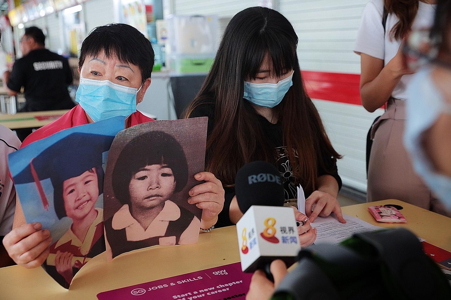Madam Ang Goon Lay, with photos of her daughter Lim Shiow Rong, who was raped and murdered more than 25 years ago, and Ms Lim Jia Hui, the victim's sister, speaking to the media after a meeting with the police yesterday.