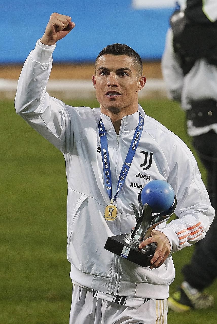 Cristiano Ronaldo celebrating after helping Juventus beat Napoli 2-0 to clinch the Italian Super Cup on Wednesday. It was the Portuguese forward's 30th trophy of his career.