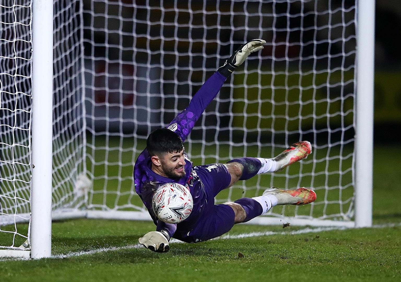 Newport County custodian Tom King (saving from Brighton's Neal Maupay in their FA Cup third round penalty shoot-out on Jan 10) set a new standard for the longest goal ever scored with his 96.01-metre kick on Tuesday.