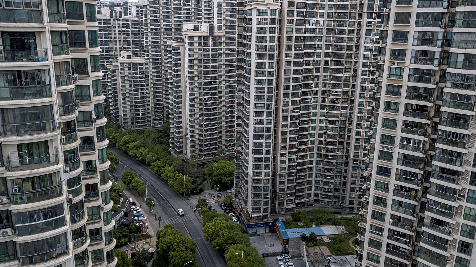Families can own two homes in Shanghai. Under the new rule, the number of homes owned by people who have been divorced for under three years will be based on the total they had when they were still married.