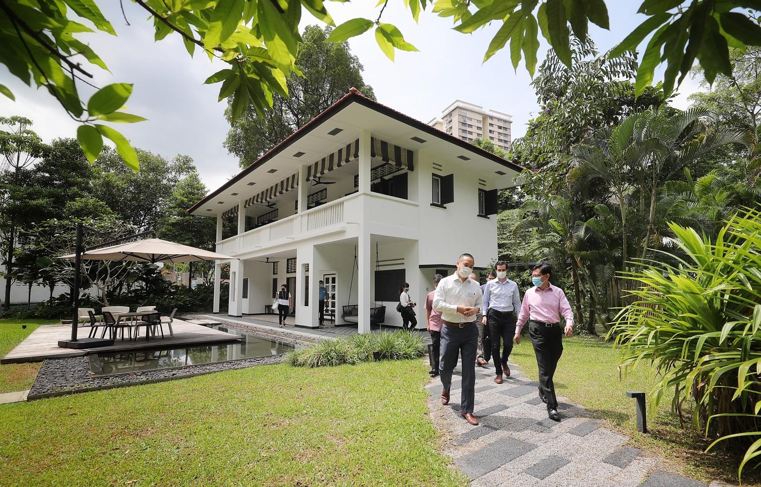 Deputy Prime Minister Heng Swee Keat with BCG Digital Ventures Singapore head Peter Cho on a tour of the new BCG Digital Ventures Singapore campus in Rochester Park yesterday. Mr Heng congratulated BCG for bringing its Digital Ventures campus to Sing