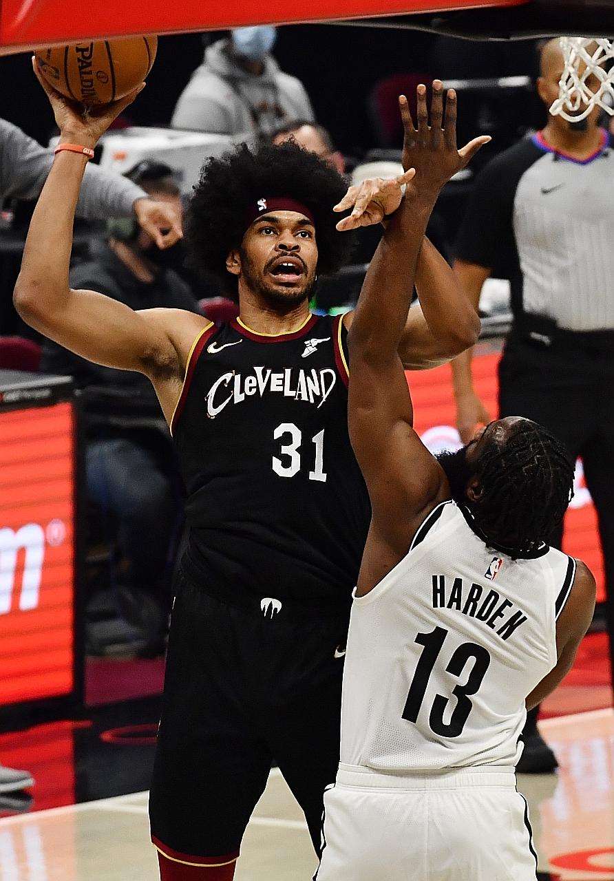Cleveland centre Jarrett Allen, formerly from Brooklyn, shoots over the Nets' new guard James Harden's outstretched arm. Both had 19 points as the Cavaliers beat the Nets for the second time in three days.