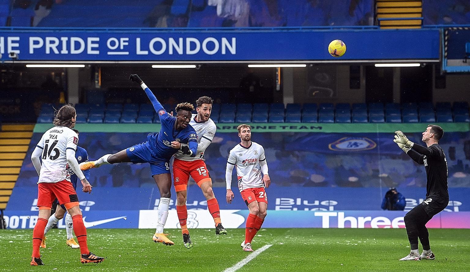Tammy Abraham scoring Chelsea's second goal during their FA Cup fourth-round match against Luton. He is the first Englishman to score an FA Cup hat-trick for the Blues since Frank Lampard, his manager, against Macclesfield in 2007.