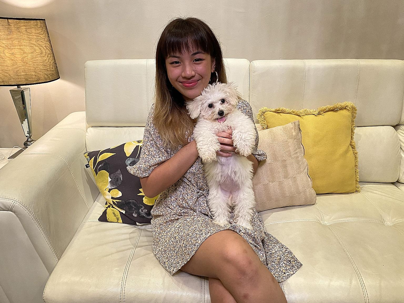 Nanyang Technological University student Isabel Joy Kua bought her three-month-old bichon frise, Sunny, for $8,900 last month.