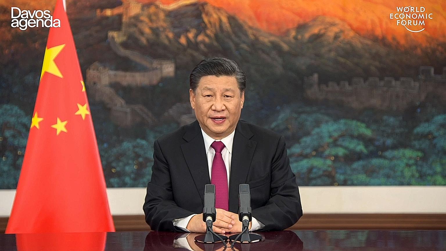 Chinese President Xi Jinping delivering a special address yesterday at the World Economic Forum's The Davos Agenda, where he touched on issues such as the economic crisis and climate change.