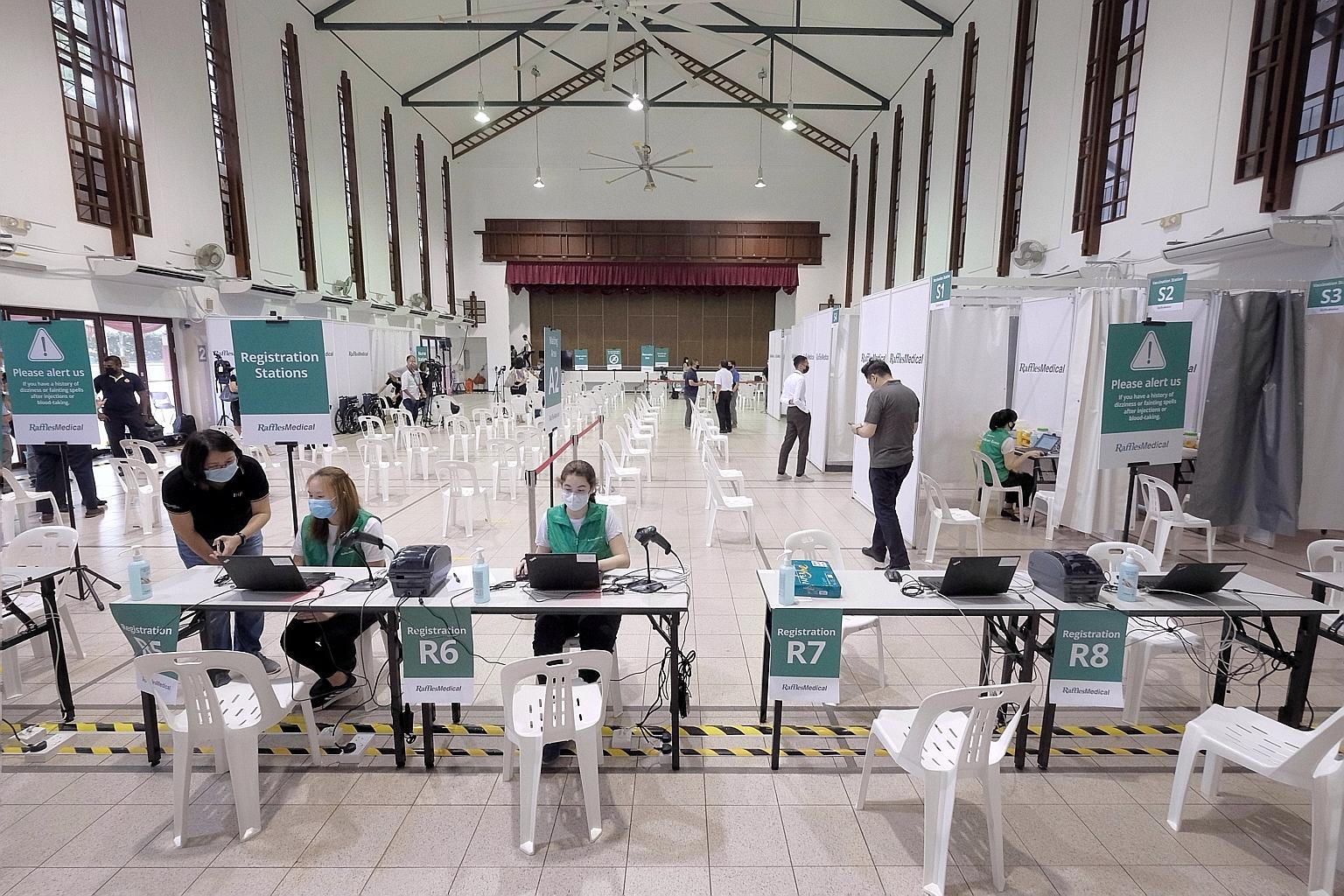The community vaccination centre in Tanjong Pagar Community Club (above) is one of the first two such facilities set up to cater to residents aged 70 and above, in the latest phase of the nationwide Covid-19 vaccination drive. Vaccination begins for
