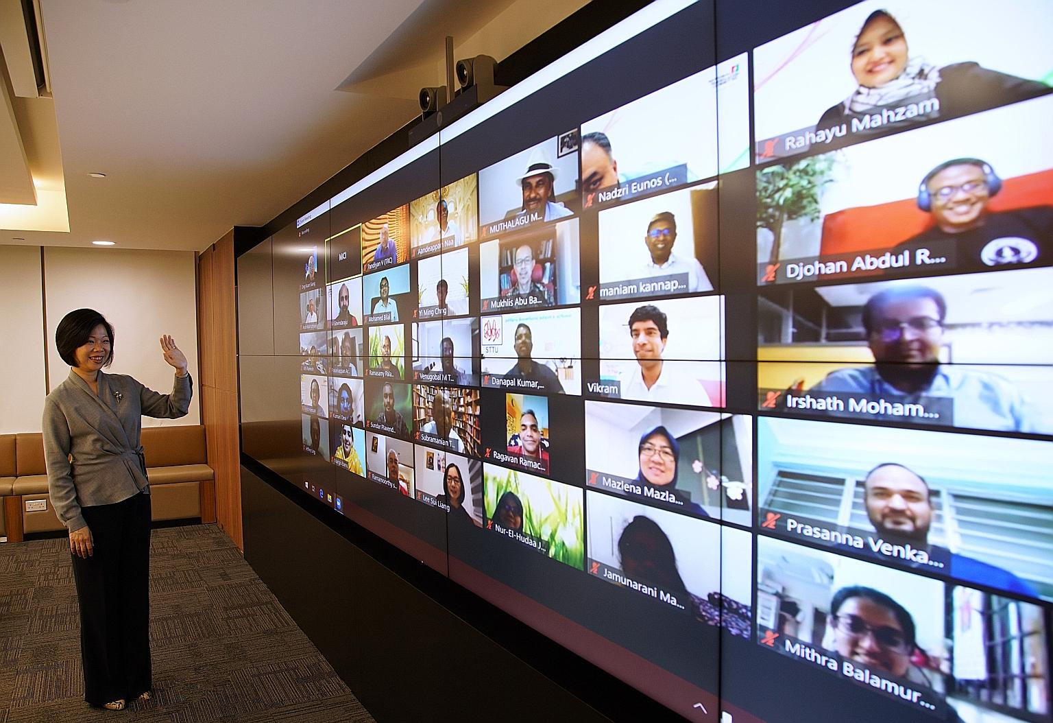 Senior Minister of State for Communications and Information Sim Ann at a virtual dialogue yesterday to get more people to sign up as volunteer citizen translators to help pinpoint errors in government communication materials.