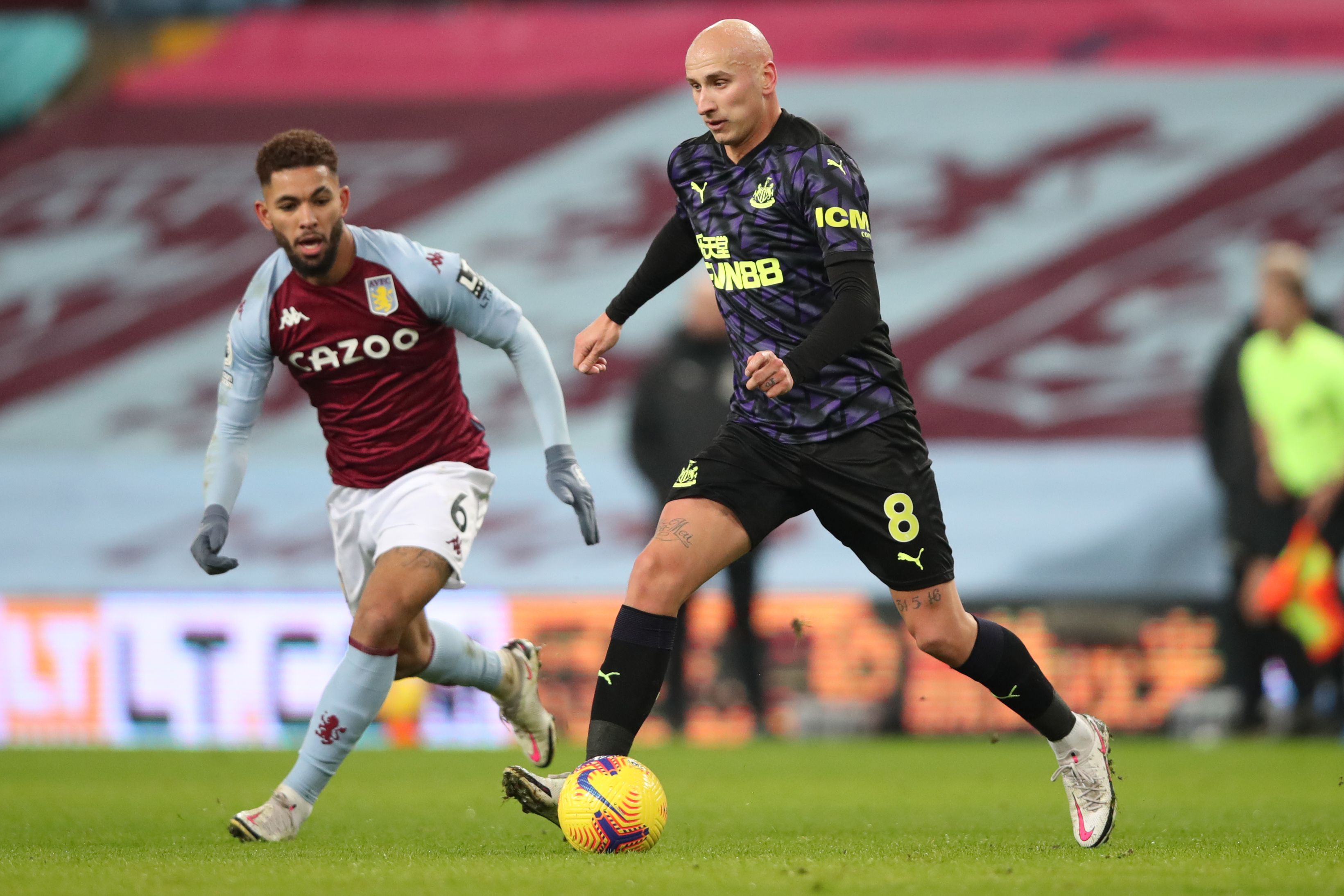 Newcastle United's English midfielder Jonjo Shelvey (right) during the English Premier League football match at Villa Park in Birmingham, on Jan 23, 2021.