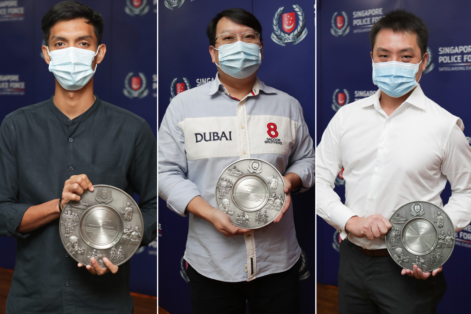 (From left) Firefighter Muhammad Suhanas Abdul Aziz, Grab driver Ong Keng Chor and Wildlife Reserves Singapore employee Elisha Teo with their awards for public spiritedness yesterday.