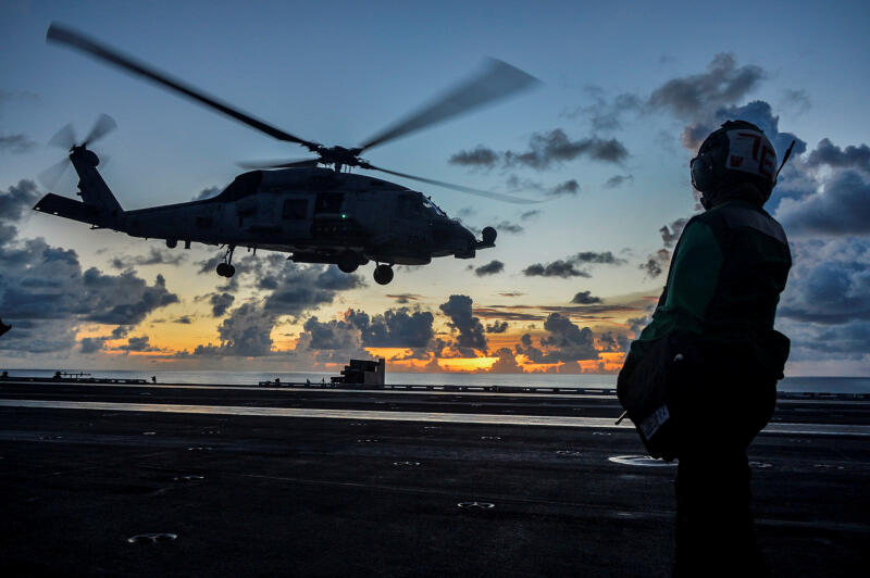 An MH-60R Sea Hawk helicopter launches during flight operations aboard the US Navy aircraft carrier USS Ronald Reagan in the South China Sea on July 17, 2020.