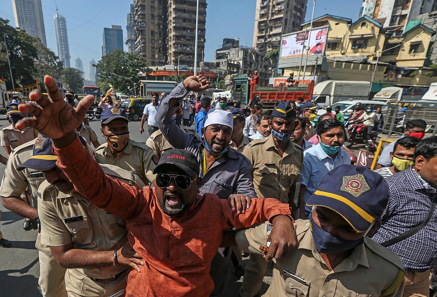 Activists shouting slogans during a demonstration to support the ongoing farmers' protest in New Delhi, at Nagpada, one of the busiest traffic junctions in Mumbai, yesterday. The scenes of unruly farmers may undermine their cause, says a New Delhi-ba