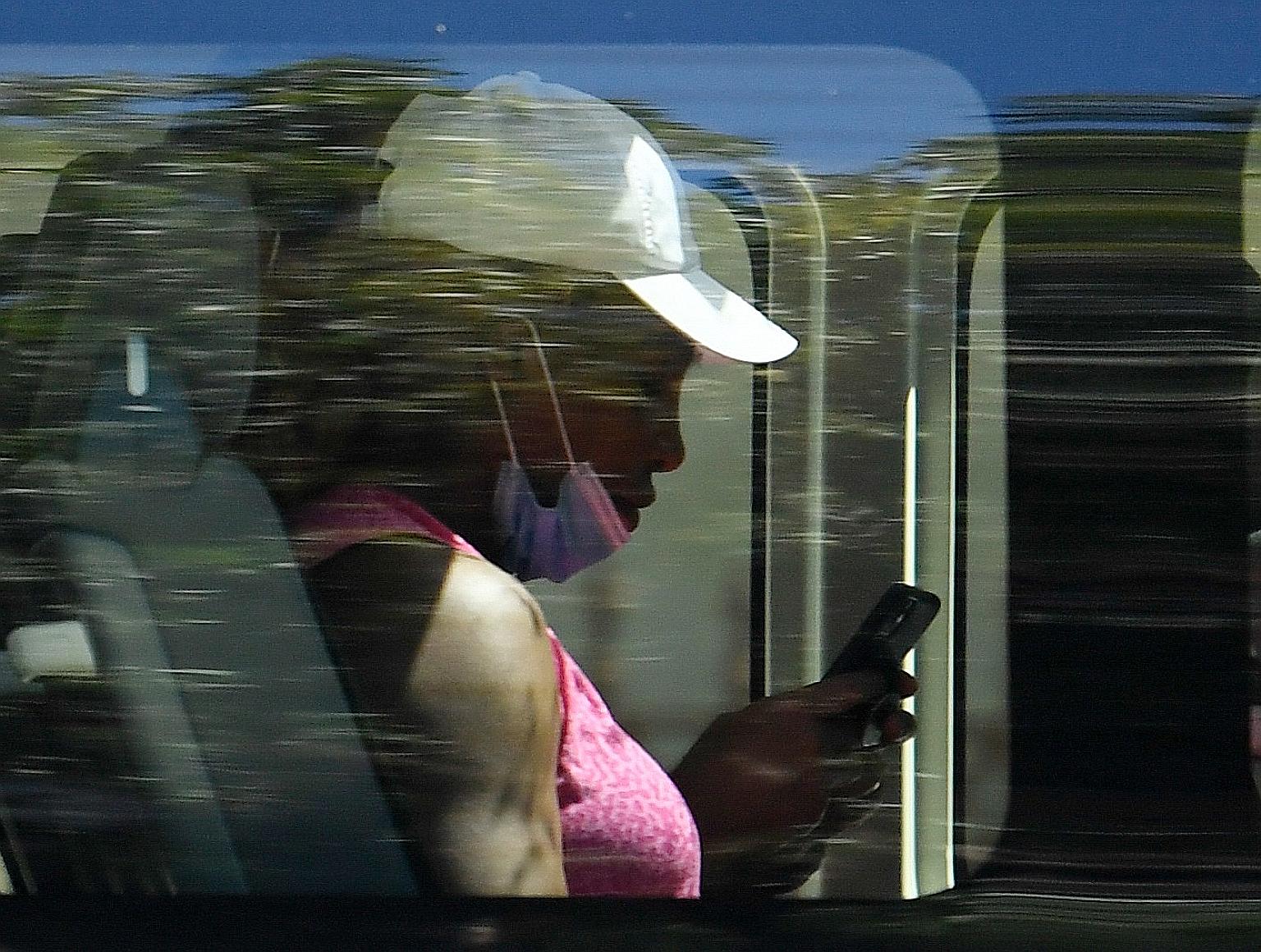 Seven-time Australian Open singles champion Serena Williams returning in a bus from training to the M Suites hotel in Adelaide, where tennis players are undergoing quarantine.