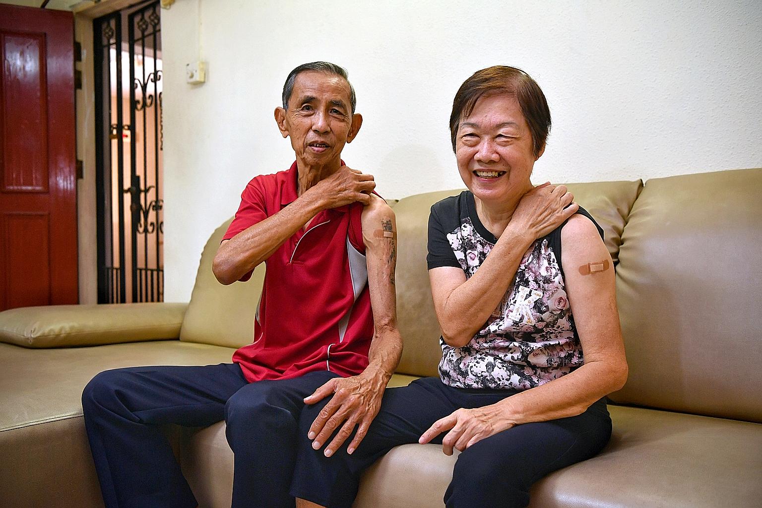 Retired bus inspector Goh Chin Heng, 75, and his wife Tan Choon Kiat, 71, at home after getting the Covid-19 vaccination at Ang Mo Kio Polyclinic, where over 200 had made appointments to receive vaccine jabs yesterday.