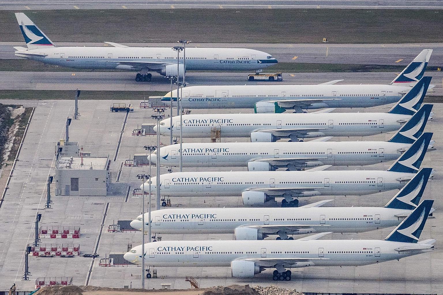 Once one of Asia's largest operators, Cathay closed its Cathay Dragon subsidiary last year and made about 6,000 employees redundant in a bid to save cash. Passenger numbers have been some 98 per cent below pre-pandemic levels since last April. PHOTO: