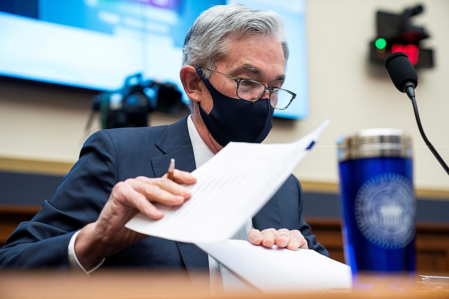 US Federal Reserve chairman Jerome Powell's comments about a "highly uncertain" economic outlook appeared to prick the nascent asset bubble, with major US stock indexes dropping over 2 per cent by the close of trading.