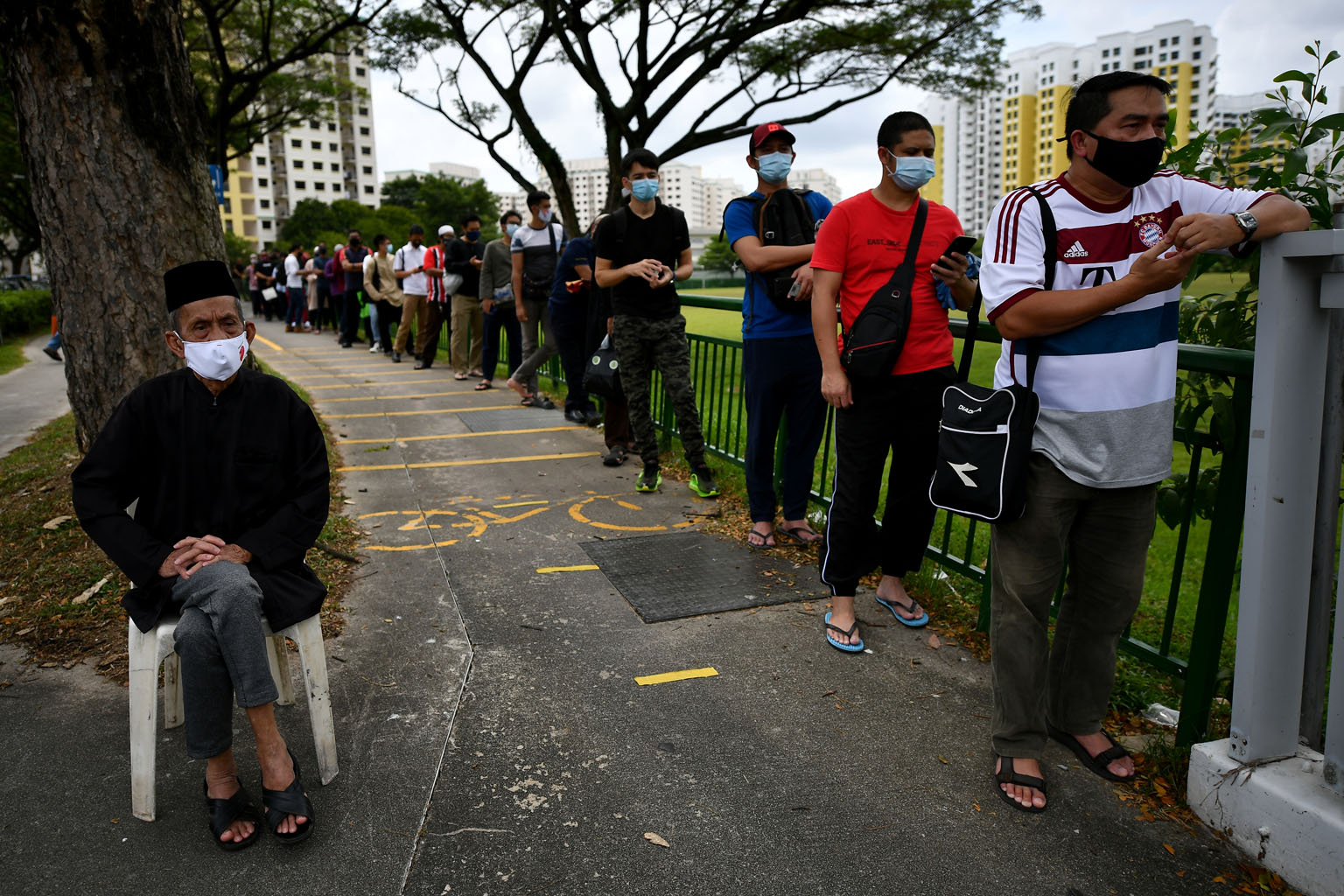 Worshippers waiting to enter the Assyafaah Mosque in Sembawang yesterday. The sermons there and at the Yusof Ishak Mosque in Woodlands were delivered by the two deputy muftis - Dr Mohammad Hannan Hassan and Ustaz Mohd Murat Md Aris respectively - who