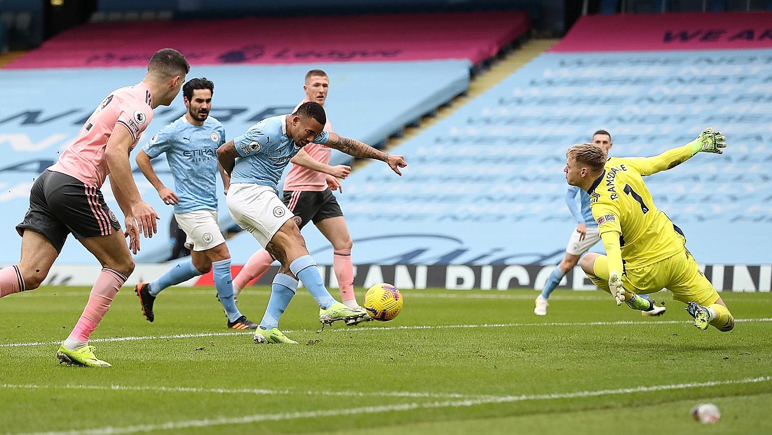 Manchester City forward Gabriel Jesus is left all alone in the box in the ninth minute to smash home the only goal past Sheffield United's Aaron Ramsdale. In a meeting between the Premier League's top and bottom teams, City won 1-0 at the Etihad to e