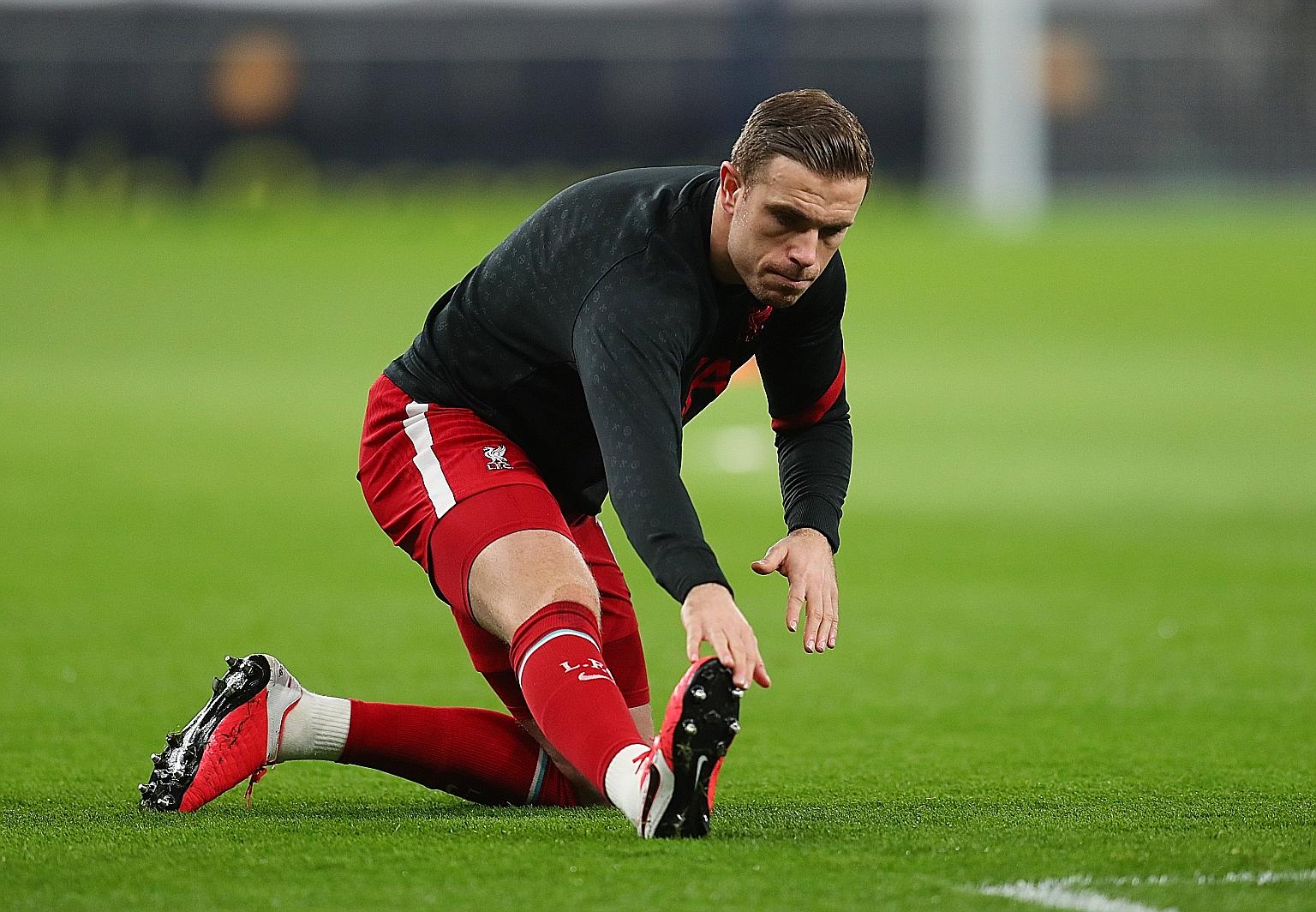 Jordan Henderson (above) is likely to partner either Nat Phillips or Rhys Williams against West Ham.