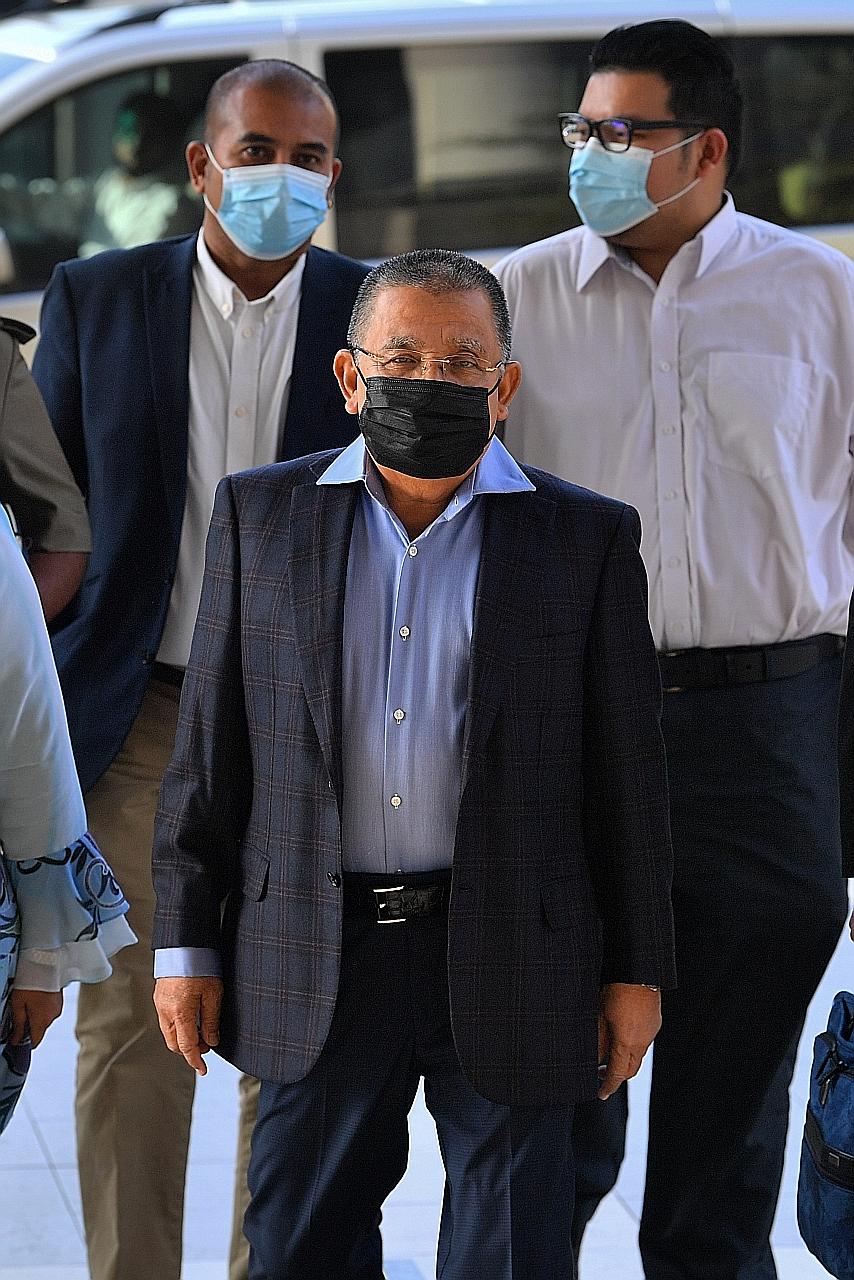 Isa Samad (in front) was convicted of corruption by the Malaysian High Court in a case involving a hotel deal inked in 2014, when he was chairman of Malaysia's Federal Land Development Authority.