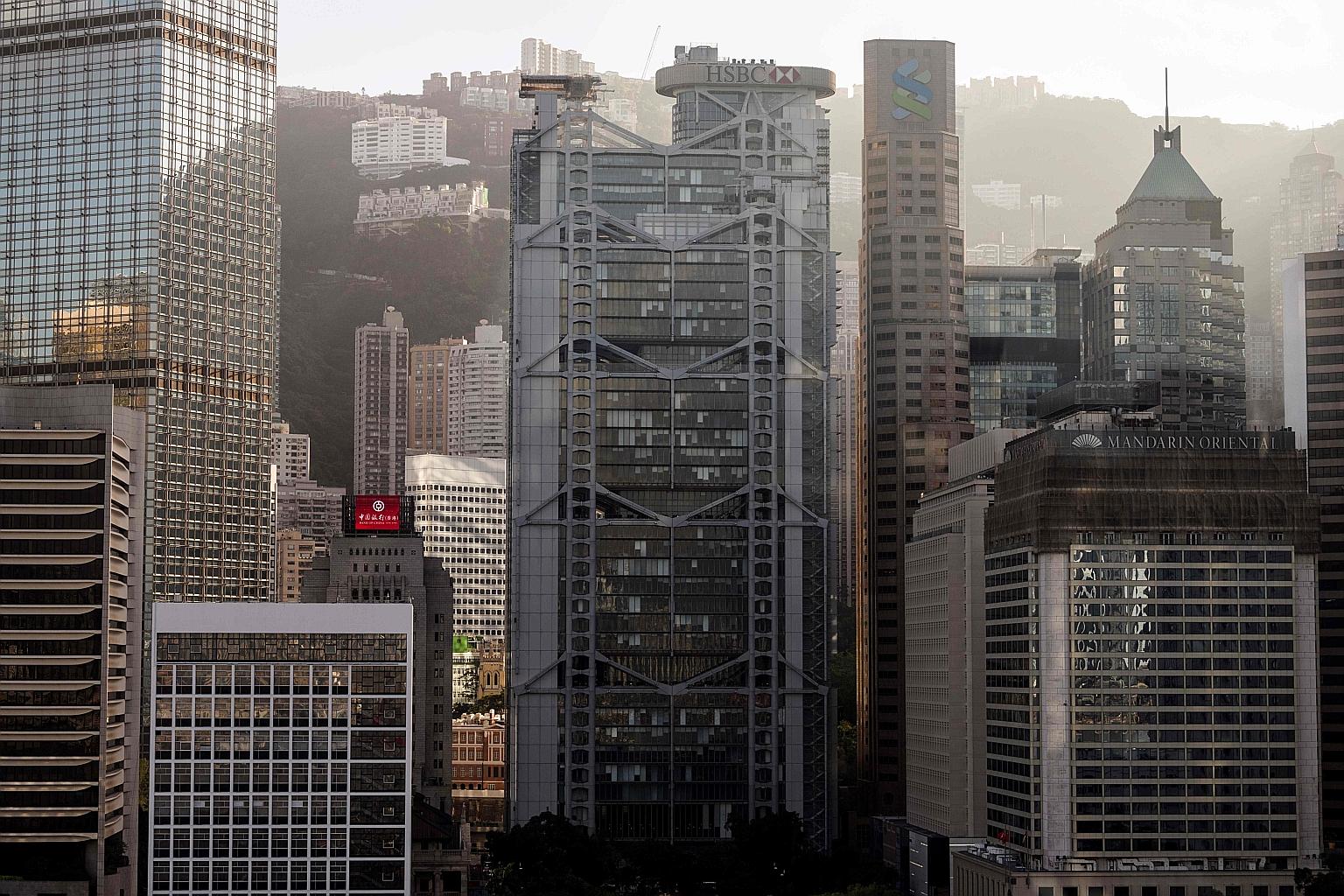 Stanchart Building StanChart gives up space in HK buildings | The Straits Times