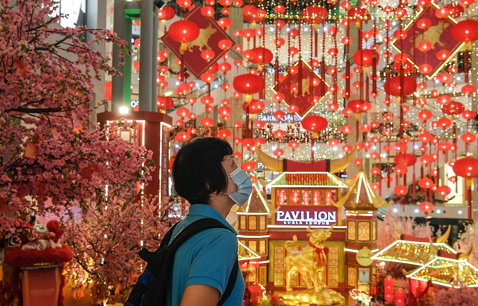 Pavilion mall in Kuala Lumpur decked with Chinese New Year decorations. To curb the spread of Covid-19, Malaysia has banned activities such as lion dances, lantern processions and Chingay processions this Chinese New Year. PHOTO: BERNAMA