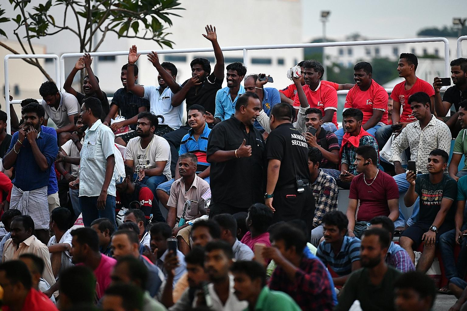 Migrant workers enjoying a stage performance in 2019. One of the survey's key findings was that most Singapore residents are supportive of protecting migrant workers' welfare.